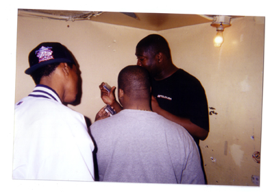 Kenny Parker looking at a DAT tape.