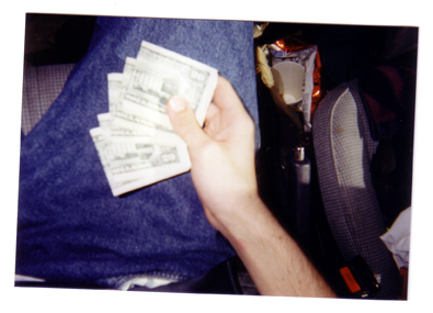 Me Holding $500
